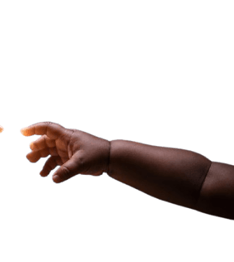 A child's hand reaching toward a robot's hand